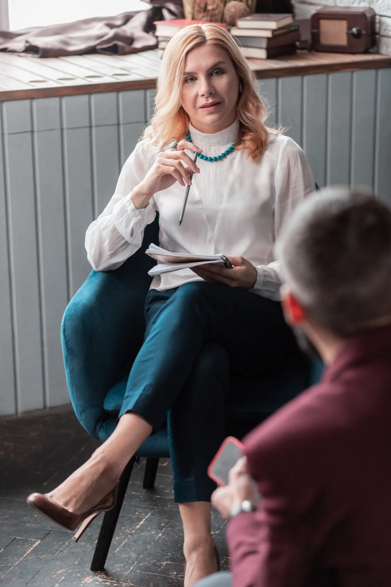A counsellor in conversation with a client